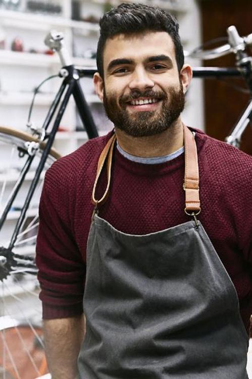 Mécanicien, client CBC, présent dans son atelier de vélo